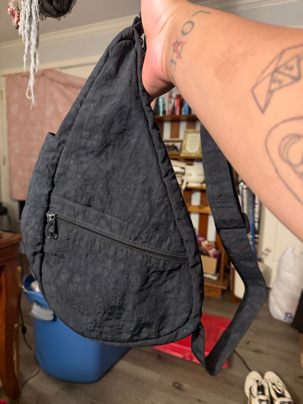 Ameribag Black Sling Backpack with Front Zip Pocket